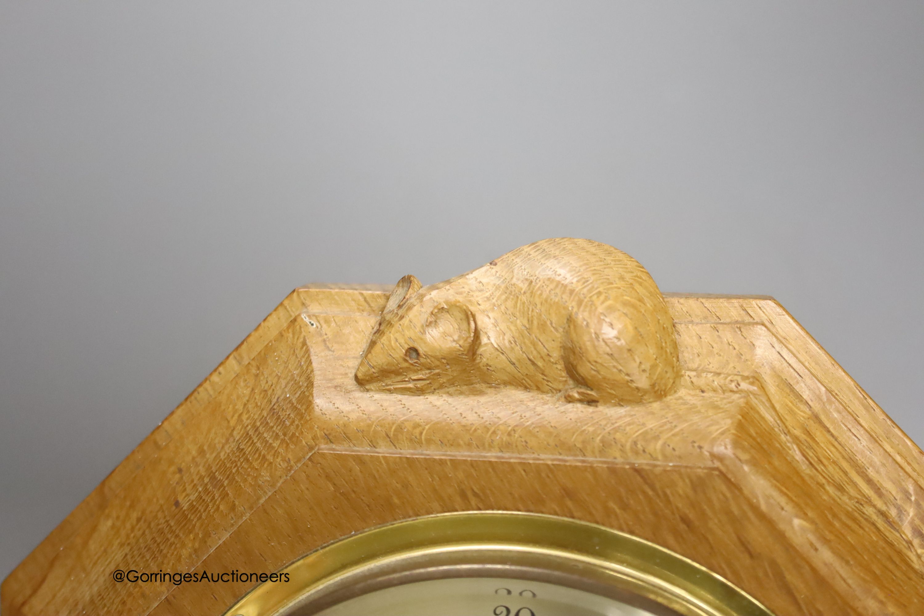A Mouseman octagonal oak aneroid barometer, 21cm